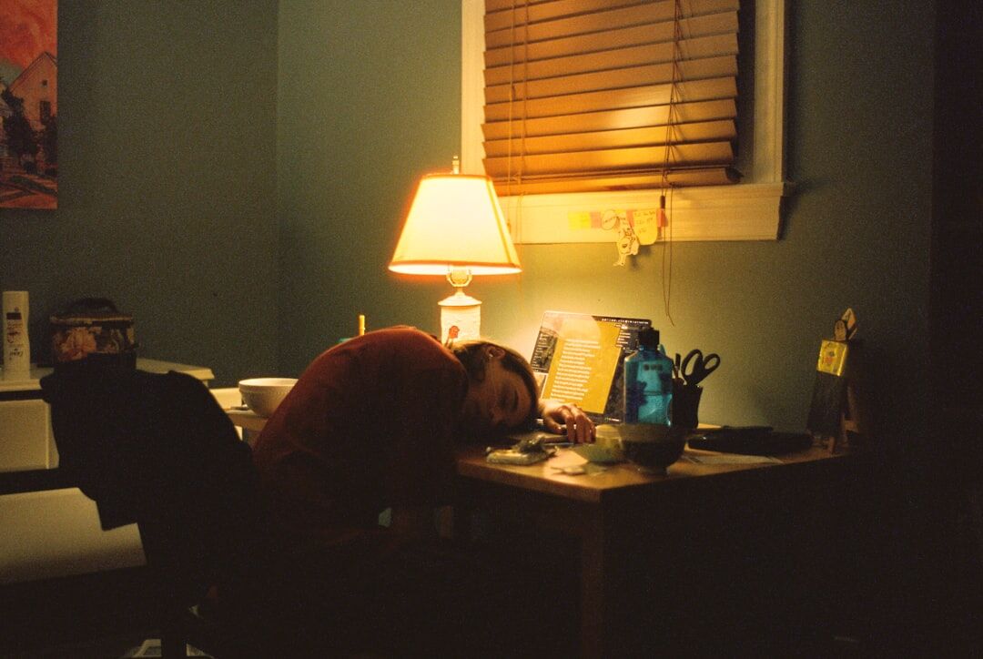 author writing at desk