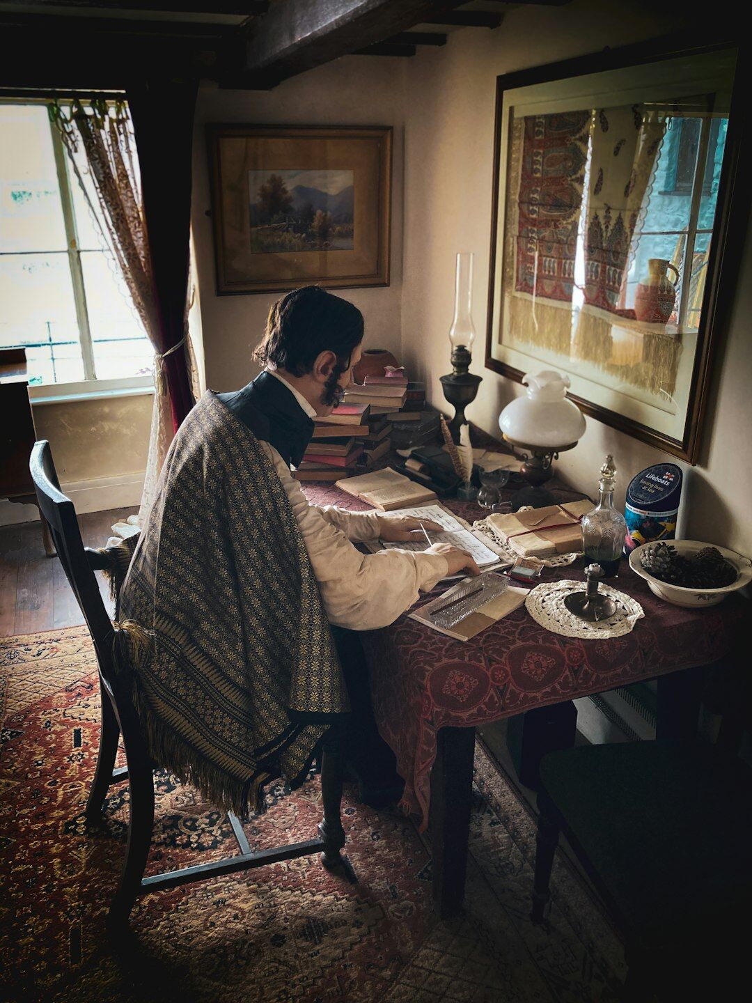 woman writing mystery novel at desk